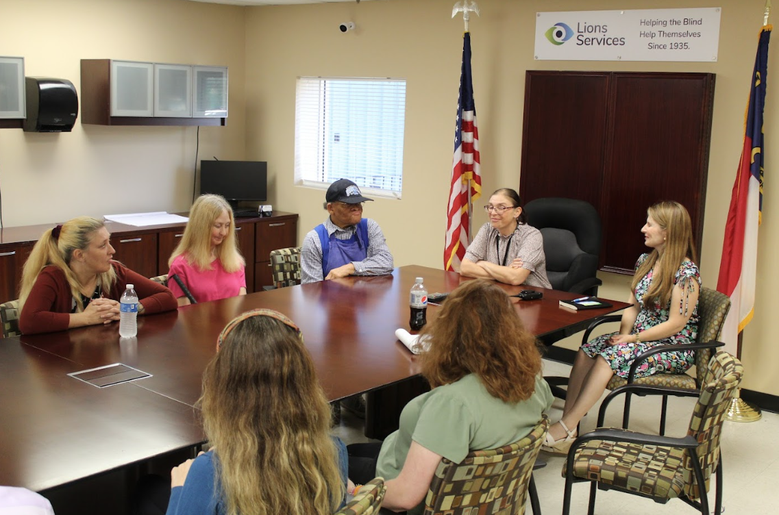 Image Displays Discussion with Lions Services Staff and Charlotte Museum of History Team