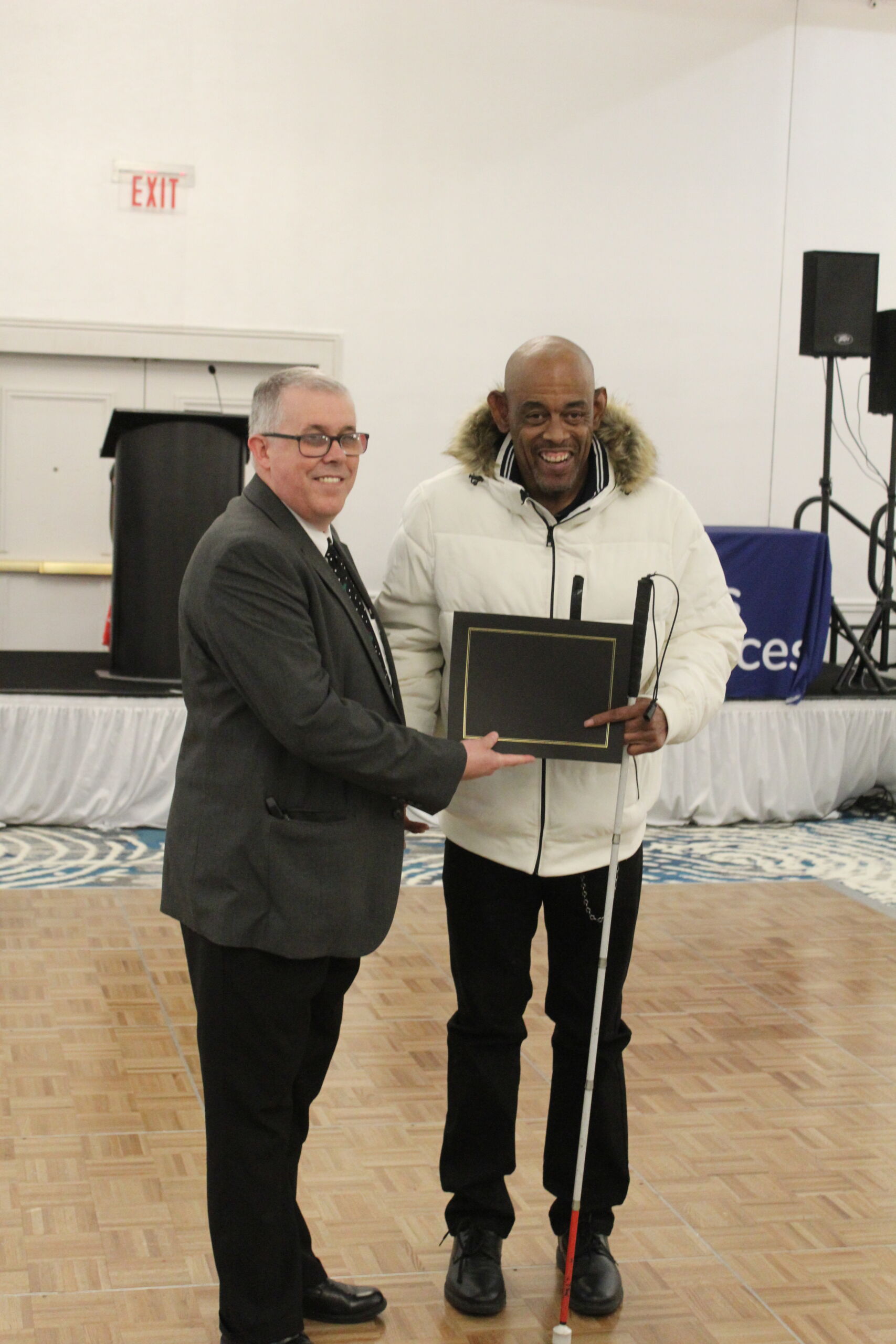 Barney Fleming with fellow Lions Services team members, representing 45 years of community