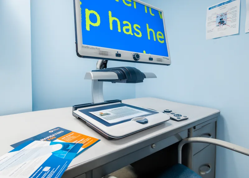 An accessible CCTV magnifier on display, demonstrating assistive technology that LionsROAR advocates for and helps people access